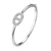Charles Garnier Charles Garnier Sterling Silver Hinged Bangle With CZ Marina Motif (22x14mm) Rhodium Finish